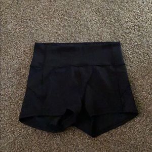 Size 6 Lululemon black booty shorts